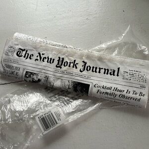 Kate Spade newspaper clutch